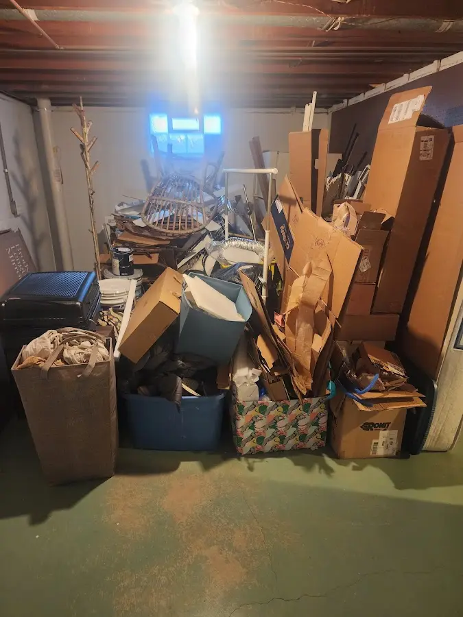 Roll-off dumpster container at job site for 4 Yard Dumpster Rental in Medford